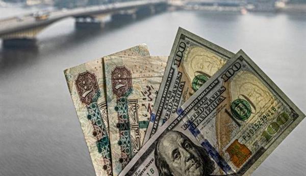 الدولار يواصل استقرارة في بداية التعاملات