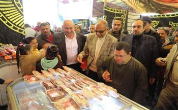   محافظ المنيا يصطحب شاب من مصابي متلازمة داون خلال افتتاحه معرضين" أهلاً رمضان" بمغاغه