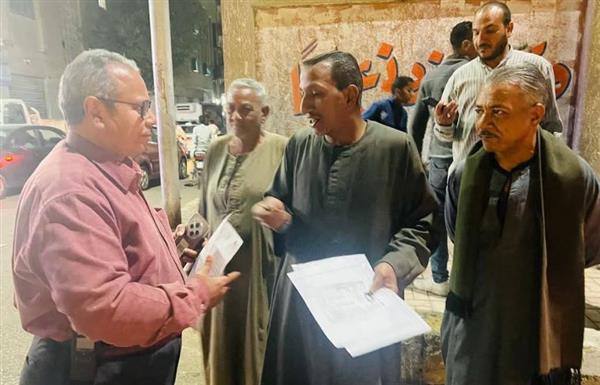 بالصور "حلمي" يقود حملة موسعة للإنارة والنظافة والتفتيش على المحال التجارية بقنا