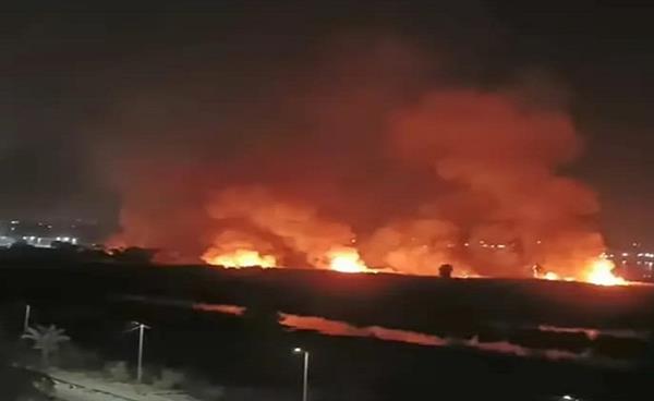 جهود مكثفة لإخماد حريق على كورنيش النيل بحلوان