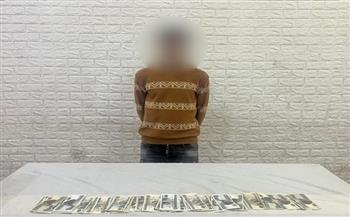   القبض على لص سرق مالا من محل بالخليفة بأسلوب المغافلة