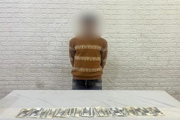 القبض على لص سرق مالا من محل بالخليفة بأسلوب المغافلة