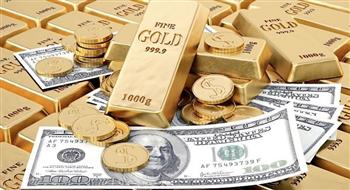   الذهب يتراجع مع صعود الدولار بعد نبرة بنك الفيدرالي الأمريكي المتشددة