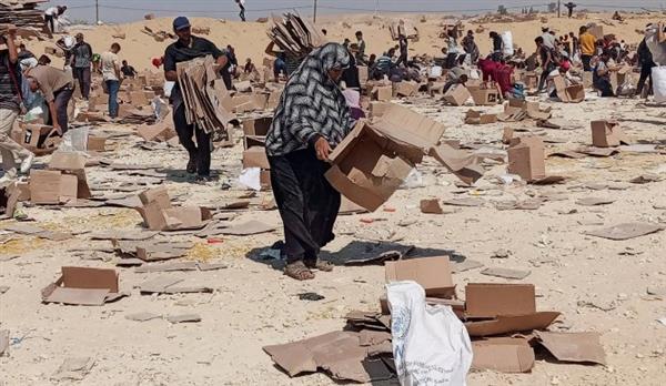 المنظمات الأهلية الفلسطينية: مراكز توزيع المساعدات الإنسانية كمائن موت وقتل للمدنيين