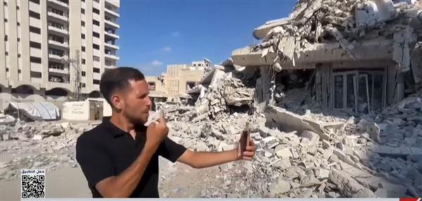 شاب فلسطيني أصم يوثق العدوان على غزة بلغة الإشارة