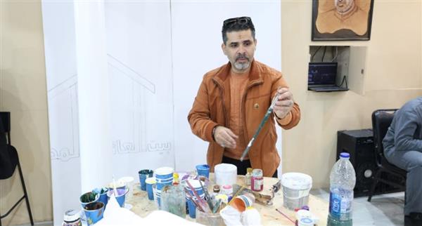 لوحة عملاقة توثق مسيرة الإمام الأكبر بجناح الأزهر