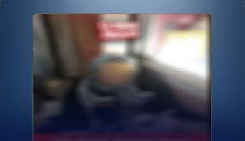   كشف ملابسات صورة متداولة لسيدة تحمل طفلة بالقاهرة