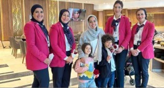 مطار القاهرة الدولي يحتفل بالأمهات في عيدهن