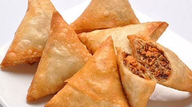مخاطر السمبوسك والقطايف على المعدة والقلب