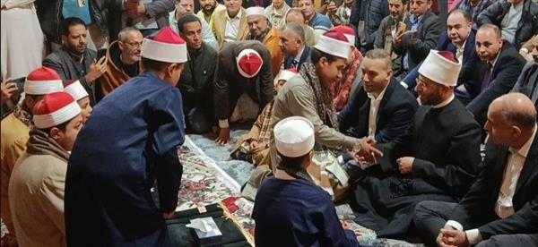 وزير الأوقاف يستمع لمتسابقي "أصوات من السماء" بالمنيا ويتفقد اصطفاف 8000 كرتونة رمضان