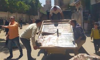    الجيزة تزيل إشغالات وتعديات المحال والباعة بشارع مجمع المدارس بالعمرانية