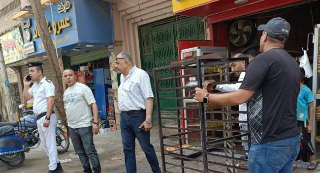 حملات مكبرة بالعمرانية لرفع الإشغالات واستعادة السيولة المرورية