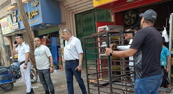 حملات مكبرة بالعمرانية لرفع الإشغالات واستعادة السيولة المرورية
