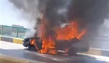 احتراق سيارة تاكسي أعلى كوبري بالمنيا دون إصابات