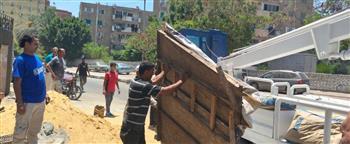 حملة مكبرة لإزالة الإشغالات بالشارع التجاري في الإسماعيلية