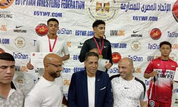  محافظ أسيوط يهنئ أبطال المصارعة 