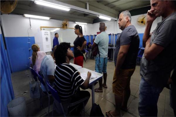   البرازيليون يصوتون في جولة الإعادة للانتخابات الرئاسية  
