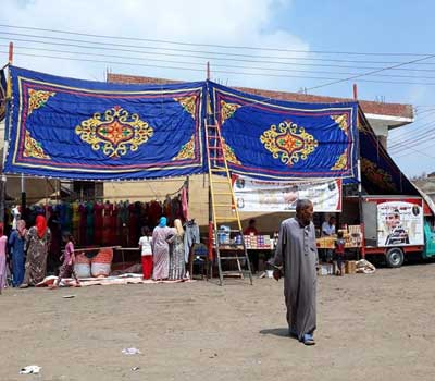   بالصور|| قافلة غذائية بأسعار مخفضة لأهالي «العمدان» في كفر الشيخ