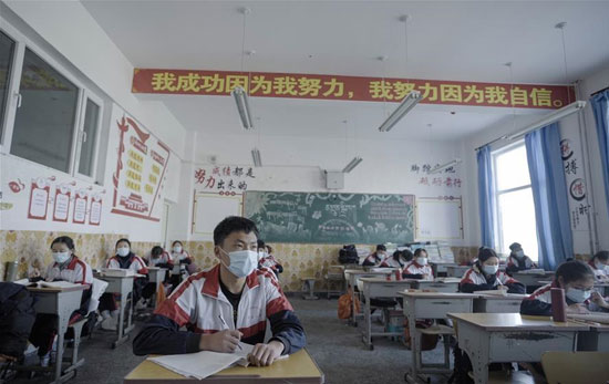   بالصور|| عودة الدراسة بمدارس الصين بعد السيطرة على «كورونا»