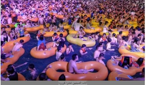   الألاف يتحدون كورونا.. شاهد| حشود صادمة تغزو شواطئ الصين دون كمامات يثير الغضب